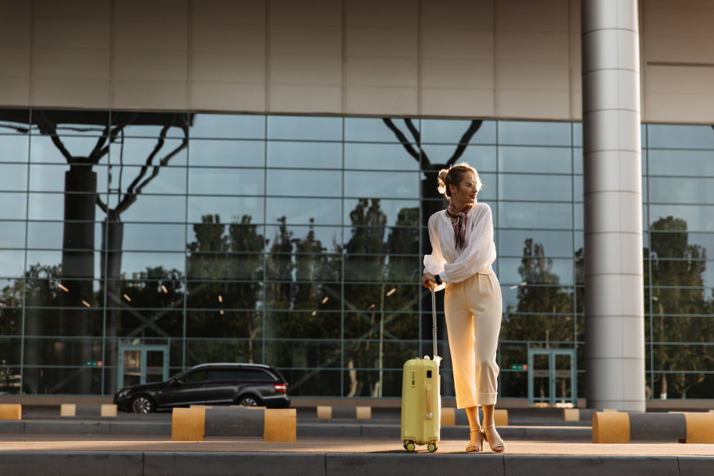 Lady in long beach airport waiting for car service